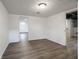 Spacious basement area showcasing vinyl flooring, and multiple access points at 4029 N Euclid Ave, Indianapolis, IN 46226