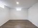 Spacious unfinished basement with vinyl floors, window, and closet space at 4029 N Euclid Ave, Indianapolis, IN 46226