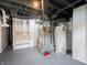 Unfinished basement area showing the furnace and water heater at 4029 N Euclid Ave, Indianapolis, IN 46226