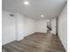 Large basement area featuring vinyl flooring, access to stairs, and utility connections at 4029 N Euclid Ave, Indianapolis, IN 46226