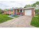 Attractive brick ranch-style home with freshly painted steps leading to an inviting front entrance at 4029 N Euclid Ave, Indianapolis, IN 46226
