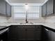Updated kitchen with stainless steel appliances, modern faucet, and new counter tops at 4029 N Euclid Ave, Indianapolis, IN 46226