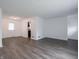 Bright living room with updated floors, fresh paint, and a modern aesthetic at 4029 N Euclid Ave, Indianapolis, IN 46226
