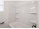 Shower and tub featuring new shower head with black fixtures at 4029 N Euclid Ave, Indianapolis, IN 46226