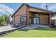 Expansive backyard with a spacious deck, lush lawn, and access to scenic outdoor living by the canal at 4107 Zinfandel Way, Indianapolis, IN 46254