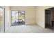 A bedroom with carpet, neutral paint, and a sliding door to the patio at 4107 Zinfandel Way, Indianapolis, IN 46254