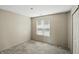 Neutral bedroom with carpet, a window with blinds, and a closet; needs a fresh coat of paint at 4107 Zinfandel Way, Indianapolis, IN 46254