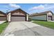 A nice house with a garage and a well-maintained driveway at 4107 Zinfandel Way, Indianapolis, IN 46254