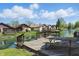 Serene waterfront homes with decks over a canal, offering picturesque views and tranquil outdoor living at 4107 Zinfandel Way, Indianapolis, IN 46254