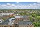 Aerial view showcasing rooftop decks and the building's position within a vibrant cityscape at 430 N Park Ave # 103, Indianapolis, IN 46202