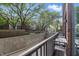 Outdoor balcony with seating offers a relaxing space with views of the community at 430 N Park Ave # 103, Indianapolis, IN 46202