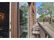 A cozy outdoor balcony features seating with a view of the surrounding neighborhood at 430 N Park Ave # 103, Indianapolis, IN 46202
