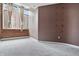 Bedroom with a large window and neutral tones at 430 N Park Ave # 103, Indianapolis, IN 46202
