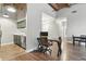 Open-concept view of living area and kitchen with modern finishes at 430 N Park Ave # 103, Indianapolis, IN 46202