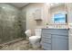 Modern bathroom with walk-in shower, tiled walls, and stylish vanity at 440 Linden St, Zionsville, IN 46077