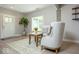 Bright living room featuring hardwood floors, modern furnishings, and a sunny window seat at 440 Linden St, Zionsville, IN 46077