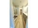 Bathroom features a modern glass enclosed shower, double vanity, and wood-look flooring at 4734 Cleome Dr, Plainfield, IN 46168