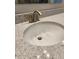 Close-up of bathroom sink featuring granite countertops and bronze faucet at 4734 Cleome Dr, Plainfield, IN 46168