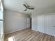 Bedroom featuring natural light, ceiling fan and spacious closet at 4734 Cleome Dr, Plainfield, IN 46168