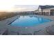 Inviting community pool with lounge chairs, offering a relaxing space for residents at 4734 Cleome Dr, Plainfield, IN 46168