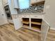 Kitchen cabinetry featuring soft close drawer pulls with granite countertops and tile backsplash at 4734 Cleome Dr, Plainfield, IN 46168