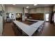 Spacious meeting room with tables and chairs; features storage cabinets and access to other community areas at 4734 Cleome Dr, Plainfield, IN 46168