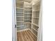 Large walk-in pantry with custom shelving at 4734 Cleome Dr, Plainfield, IN 46168