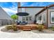 A backyard with patio furniture and a swimming pool that offers a perfect setting for relaxation and entertaining at 48 E Wisteria Way, Westfield, IN 46074