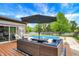Backyard showcasing the pool, patio furniture and well-maintained landscaping, perfect for relaxation and entertainment at 48 E Wisteria Way, Westfield, IN 46074