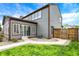 Backyard with a walkway, patio, and green grass offer outdoor entertainment space with lush landscaping at 48 E Wisteria Way, Westfield, IN 46074