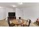Open basement featuring an entertainment area with TV, table, and comfortable seating at 48 E Wisteria Way, Westfield, IN 46074