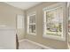 Bright home office with tile floor, two windows, and built in storage at 48 E Wisteria Way, Westfield, IN 46074