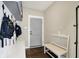 Functional mudroom with bench, hooks, and storage for bags and gear at 48 E Wisteria Way, Westfield, IN 46074