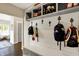 Stylish mudroom featuring a hall tree, hooks, and ample storage space for shoes and outerwear at 48 E Wisteria Way, Westfield, IN 46074