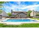 In-ground swimming pool and patio area in a well-maintained backyard at 48 E Wisteria Way, Westfield, IN 46074