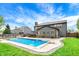 In-ground swimming pool and patio area, surrounded by a fenced yard and lush landscaping at 48 E Wisteria Way, Westfield, IN 46074