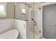 Modern bathroom with a glass-enclosed shower, stylish tile work, and a sleek, contemporary design at 48 E Wisteria Way, Westfield, IN 46074