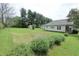 Expansive backyard with plenty of green space, perfect for outdoor activities and gardening at 489 Highland St, Morgantown, IN 46160