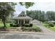 Charming craftsman style home with covered front porch and detached garage at 489 Highland St, Morgantown, IN 46160