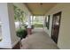 Inviting front porch with a cozy swing, perfect for enjoying the outdoors at 489 Highland St, Morgantown, IN 46160