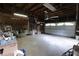 Spacious garage with overhead lighting and ample storage at 489 Highland St, Morgantown, IN 46160
