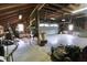 Spacious garage with exposed rafters and ample storage at 489 Highland St, Morgantown, IN 46160