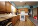 Kitchen featuring wood cabinets and white countertops at 5041 Norcroft Dr, Indianapolis, IN 46221