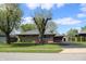 Charming single-story home featuring a well-manicured lawn and inviting curb appeal at 518 Cherry St, Beech Grove, IN 46107