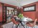 Cozy dining room featuring a chandelier and an archway leading to the living room at 5181 E Pleasant Run Pkwy S Dr, Indianapolis, IN 46219