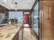 Spacious kitchen featuring granite countertops, stainless steel appliances, and custom wood cabinetry at 5181 E Pleasant Run Pkwy S Dr, Indianapolis, IN 46219