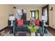 Well-appointed living room with a dark green sofa and stylish decor at 5181 E Pleasant Run Pkwy S Dr, Indianapolis, IN 46219