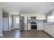 Well-lit kitchen with modern appliances, white cabinets, and an open layout at 5515 W Morris St, Indianapolis, IN 46241