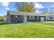 Charming single-story home with a well-manicured lawn and inviting curb appeal at 57 Hadley St, Mooresville, IN 46158