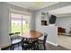 Bright dining area with a view to the outdoor landscape at 601 Shady Ln, Greenwood, IN 46142